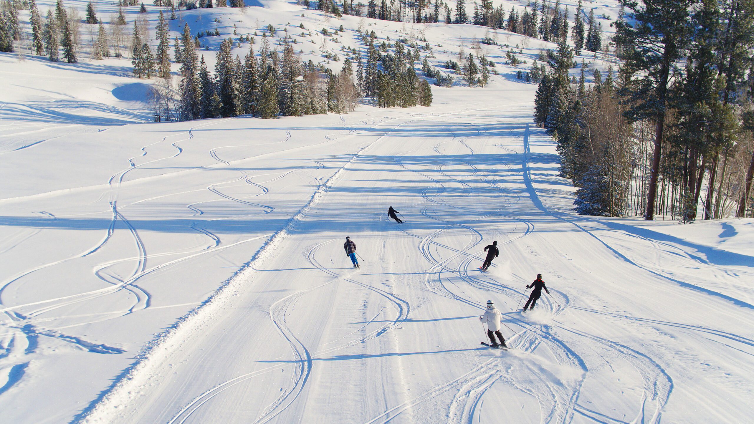 Aerial Photo Downhill Group Ski at Deer Mountain Village